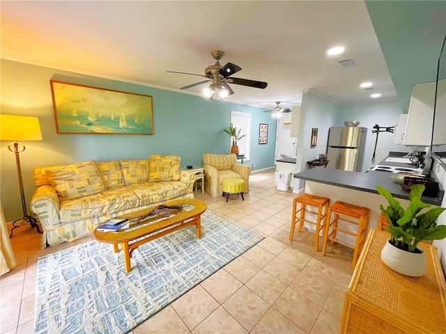 living room with light tile patterned floors, ceiling fan, and ornamental molding