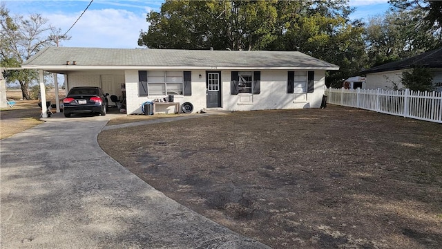 view of front of house with a carport