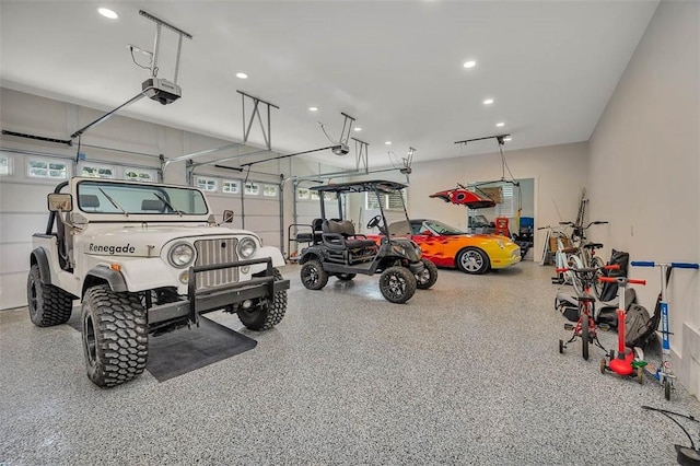 147 Butler Lake Dr, Saint Simons Island, GA 31522 - garage featuring a garage door opener and recessed lighting