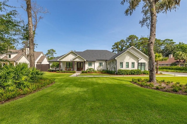 147 Butler Lake Dr, Saint Simons Island, GA 31522 - view of front of home with a front yard