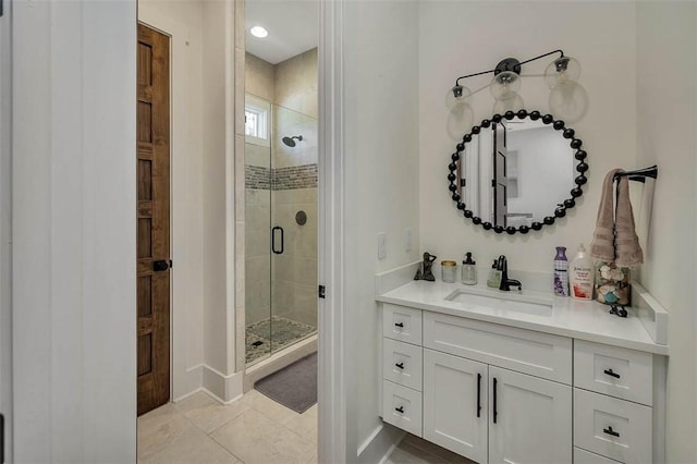 147 Butler Lake Dr, Saint Simons Island, GA 31522 - bathroom featuring vanity, a shower stall, and tile patterned flooring