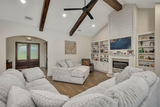 147 Butler Lake Dr, Saint Simons Island, GA 31522 - living room with arched walkways, dark wood-type flooring, ceiling fan, recessed lighting, and french doors