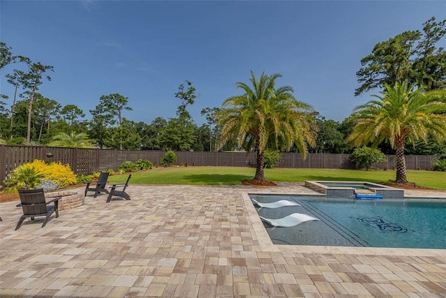 147 Butler Lake Dr, Saint Simons Island, GA 31522 - view of swimming pool with a fenced backyard, a pool with connected hot tub, and a patio area