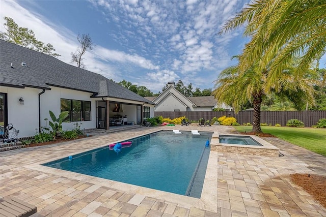 147 Butler Lake Dr, Saint Simons Island, GA 31522 - view of swimming pool with a patio, a fenced backyard, and a pool with connected hot tub