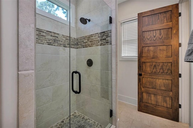 147 Butler Lake Dr, Saint Simons Island, GA 31522 - bathroom featuring a stall shower and tile patterned flooring