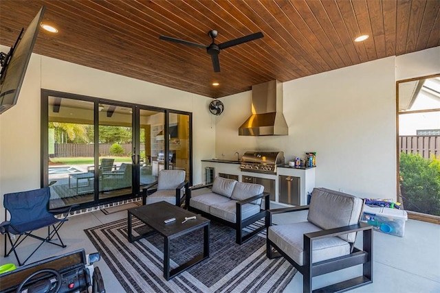 147 Butler Lake Dr, Saint Simons Island, GA 31522 - view of patio with area for grilling, an outdoor living space, and ceiling fan