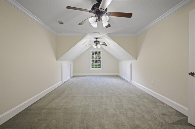 additional living space featuring carpet floors and ceiling fan