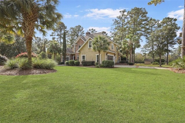 view of yard featuring a garage