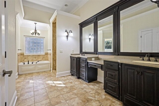 bathroom featuring vanity, a tub to relax in, crown molding, and a chandelier