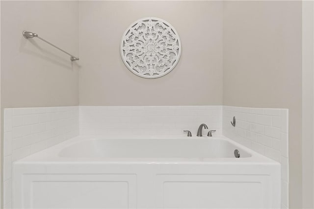 full bath with a garden tub