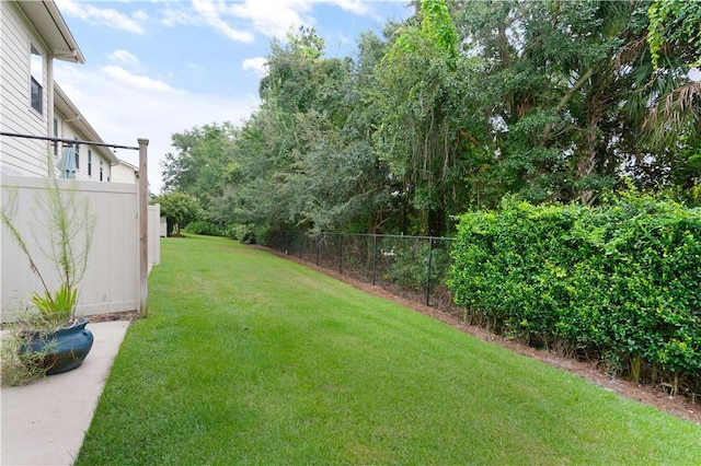 view of yard featuring fence