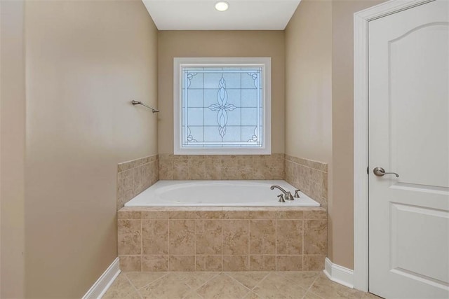 253 Winding Trl, Brunswick, GA 31523 - bathroom with a bath and tile patterned floors