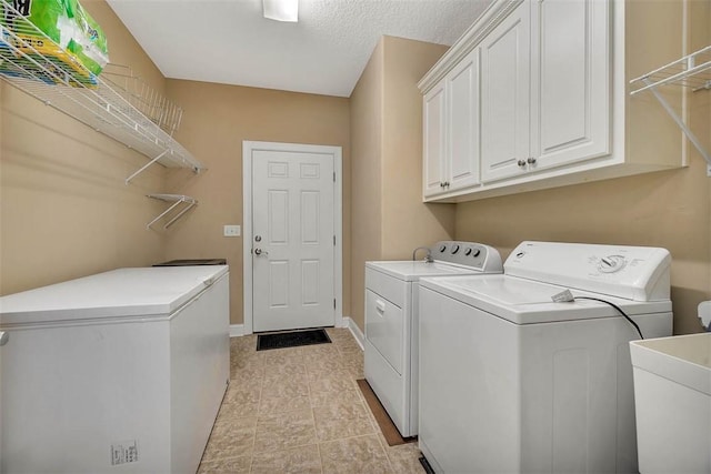 253 Winding Trl, Brunswick, GA 31523 - laundry area with washer and clothes dryer and cabinet space