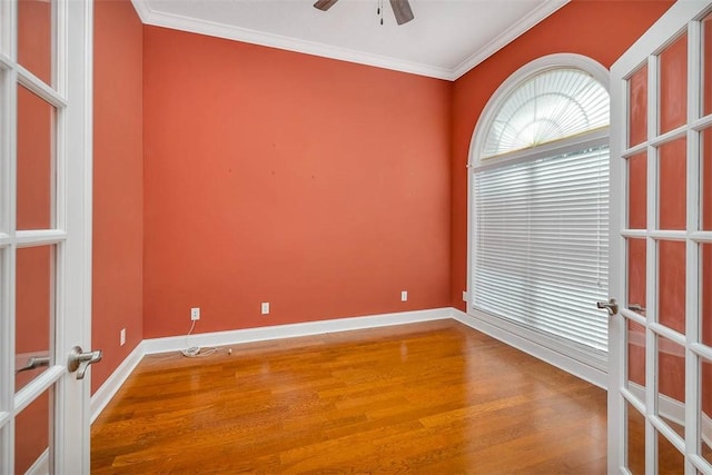 253 Winding Trl, Brunswick, GA 31523 - spare room with wood finished floors, ceiling fan, french doors, and ornamental molding