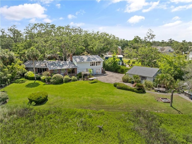 524 Wesley Oak Cir, Saint Simons Island, GA 31522 - view of subject property with a tree filled landscape