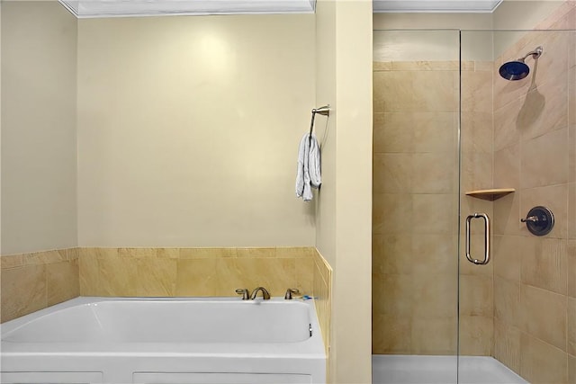 803 Mariners Cir, Saint Simons Island, GA 31522 - full bathroom featuring a stall shower and a garden tub
