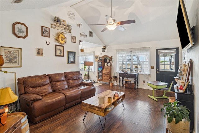 living room featuring dark wood-type flooring, ceiling fan, and lofted ceiling