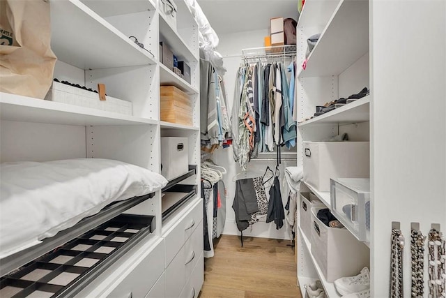 121 Fifty Oaks Ln, Saint Simons Island, GA 31522 - walk in closet with light wood-type flooring