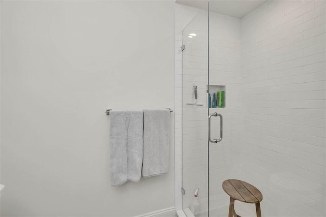 121 Fifty Oaks Ln, Saint Simons Island, GA 31522 - bathroom with a shower stall and baseboards