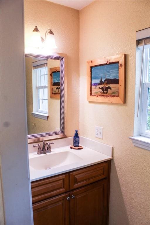 7535 Browntown Rd, Waynesville, GA 31566 - bathroom with plenty of natural light and vanity