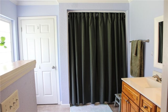 7535 Browntown Rd, Waynesville, GA 31566 - bathroom featuring ornamental molding, vanity, and tile patterned flooring