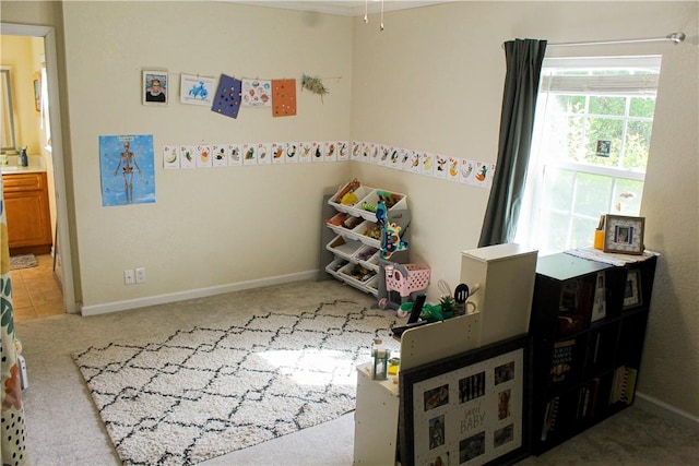 7535 Browntown Rd, Waynesville, GA 31566 - game room with carpet floors and baseboards