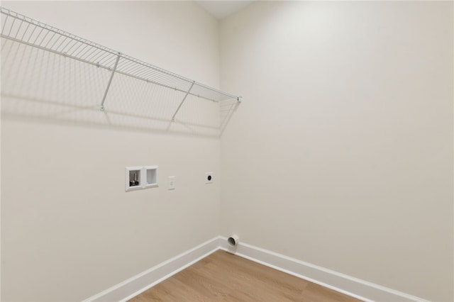 177 Verano St, Kingsland, GA 31548 - laundry room with washer hookup, hookup for an electric dryer, and light wood-type flooring