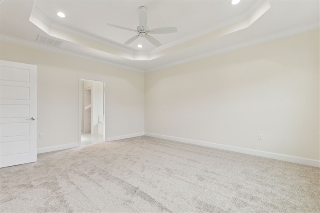 177 Verano St, Kingsland, GA 31548 - spare room featuring a tray ceiling, ornamental molding, carpet floors, recessed lighting, and ceiling fan