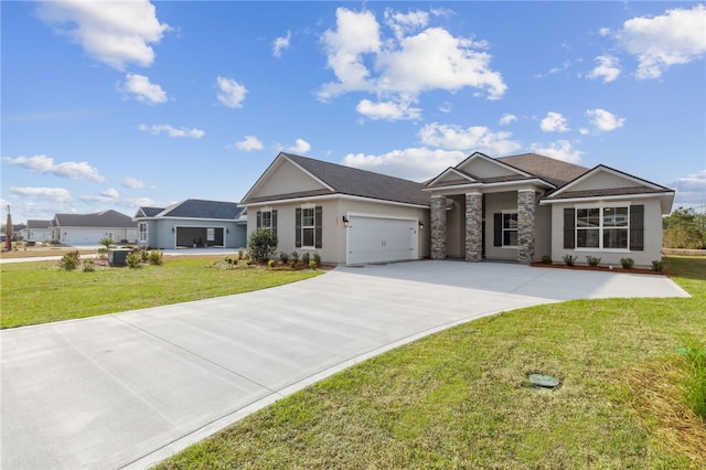 177 Verano St, Kingsland, GA 31548 - single story home with concrete driveway, a garage, a front yard, and stucco siding