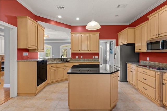 kitchen with black appliances, sink, hanging light fixtures, ornamental molding, and a kitchen island