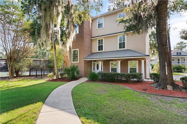 view of front of home featuring a front lawn