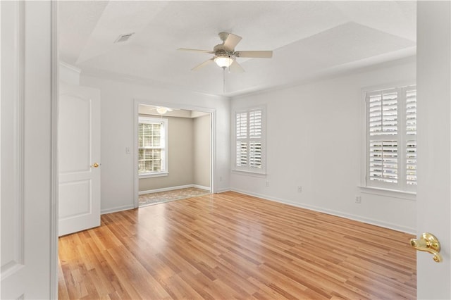 empty room featuring light hardwood / wood-style floors and ceiling fan