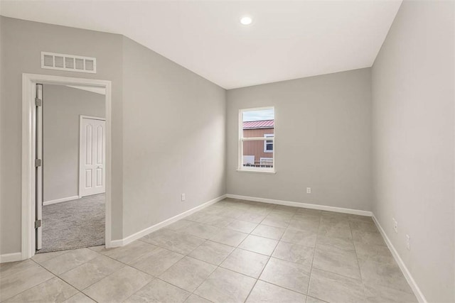 empty room featuring light tile patterned flooring