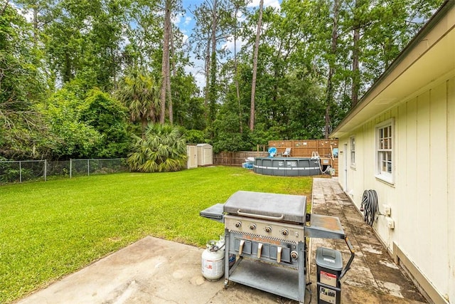 1201 Fairway Rd, Brunswick, GA 31525 - view of yard with view of wooded area and a patio