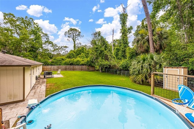 1201 Fairway Rd, Brunswick, GA 31525 - view of pool featuring a patio area and view of scattered trees