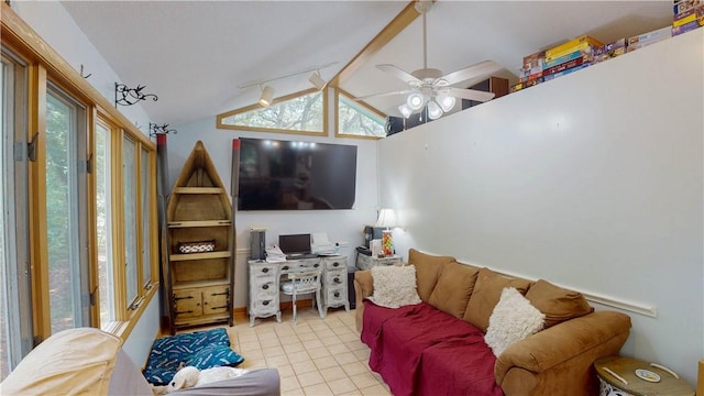 living room featuring tile patterned flooring and a ceiling fan
