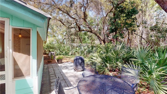 view of patio featuring outdoor dining area