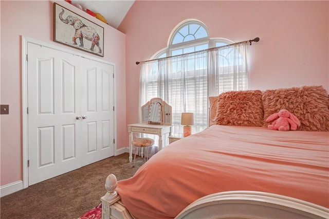 bedroom featuring vaulted ceiling, carpet flooring, and baseboards