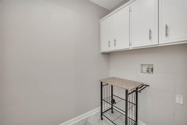 325 Crossbridge Dr, Brunswick, GA 31525 - laundry room with baseboards, cabinet space, hookup for a washing machine, and marble finish floor