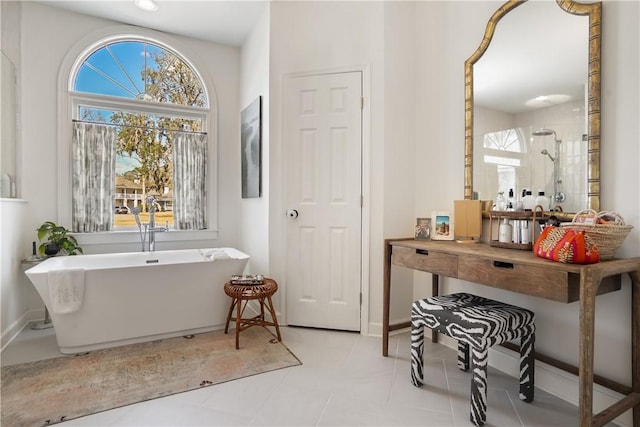 bathroom with separate shower and tub and tile patterned floors