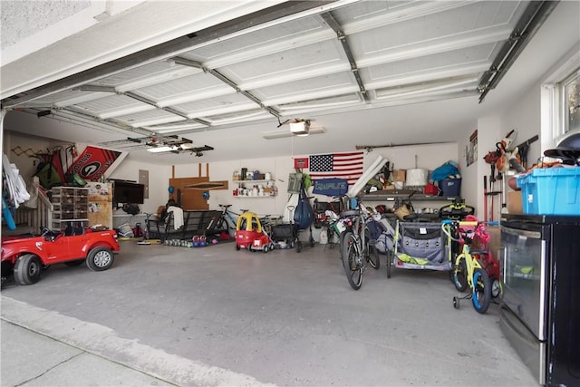 garage featuring a garage door opener