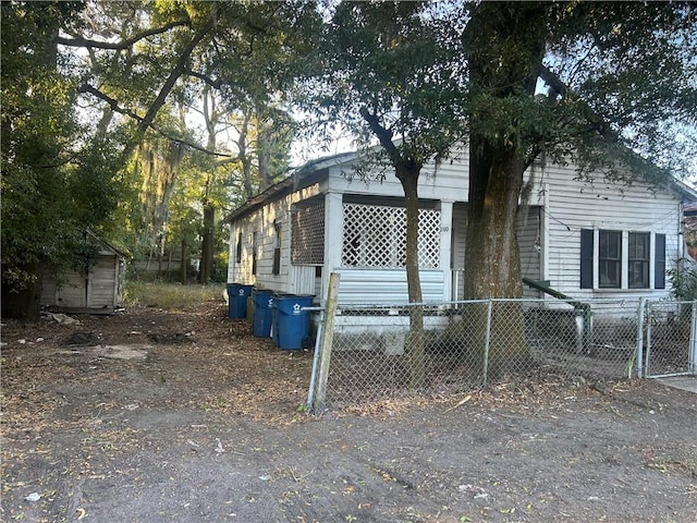 exterior space with a shed