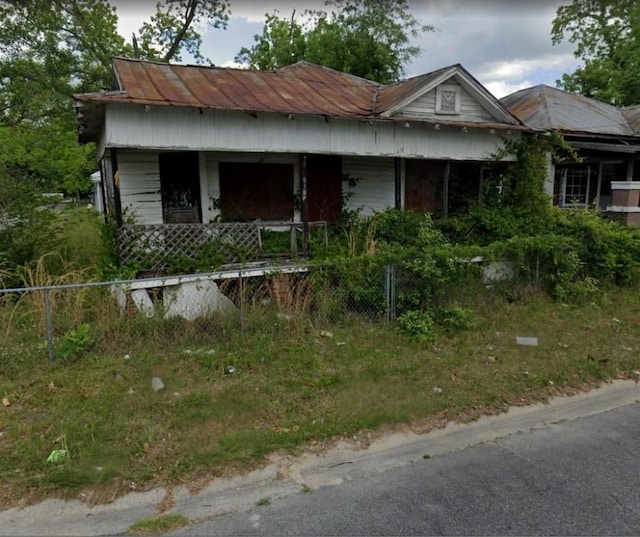 914 Pittman St, Waycross, GA 31501 - view of front of property with a porch and a metal roof
