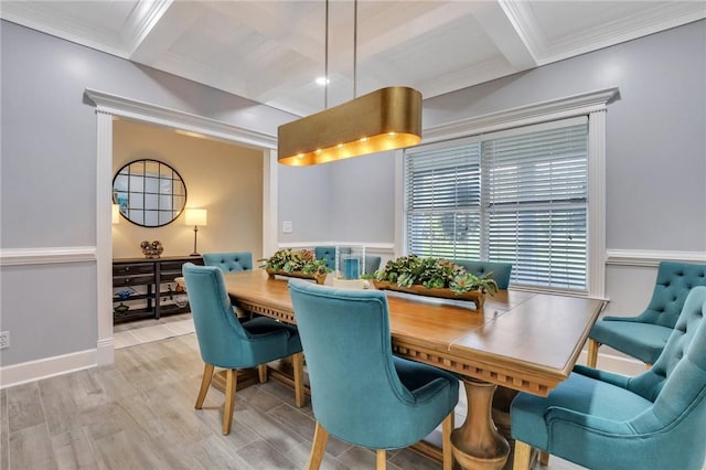 dining room with beamed ceiling, light hardwood / wood-style floors, and crown molding