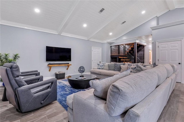 living room featuring beam ceiling, light hardwood / wood-style floors, and high vaulted ceiling