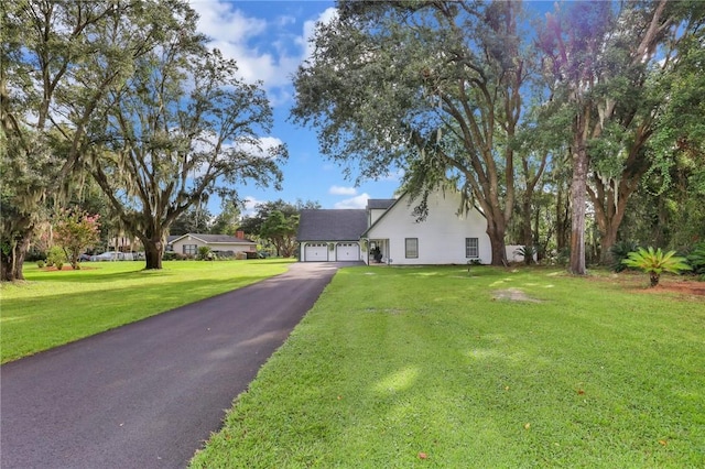 view of front of home featuring a front yard