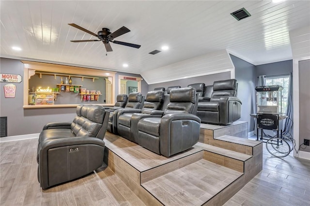 cinema featuring hardwood / wood-style flooring, ceiling fan, and wood ceiling