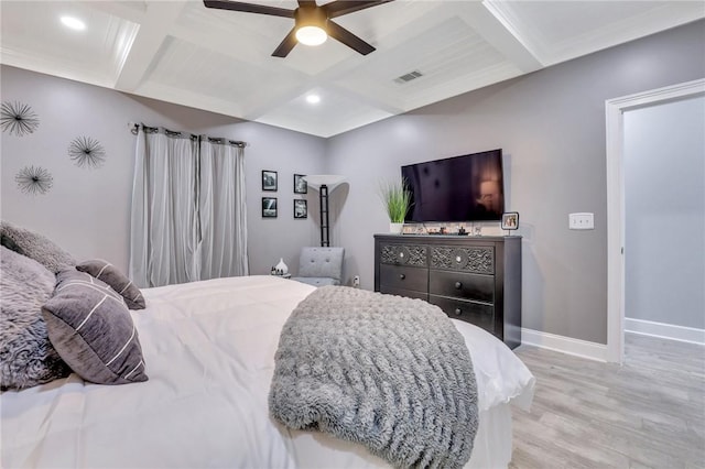 bedroom with beamed ceiling, ceiling fan, wood-type flooring, and crown molding