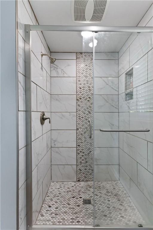 bathroom featuring walk in shower