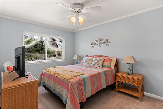 bedroom with dark colored carpet, ceiling fan, and ornamental molding